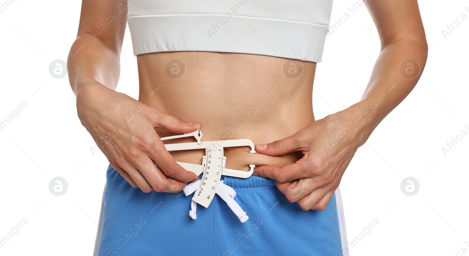 Photo of Woman measuring body fat with caliper on white background, closeup