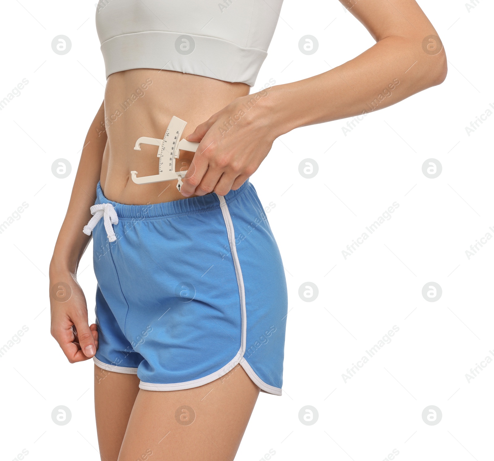 Photo of Woman measuring body fat with caliper on white background, closeup