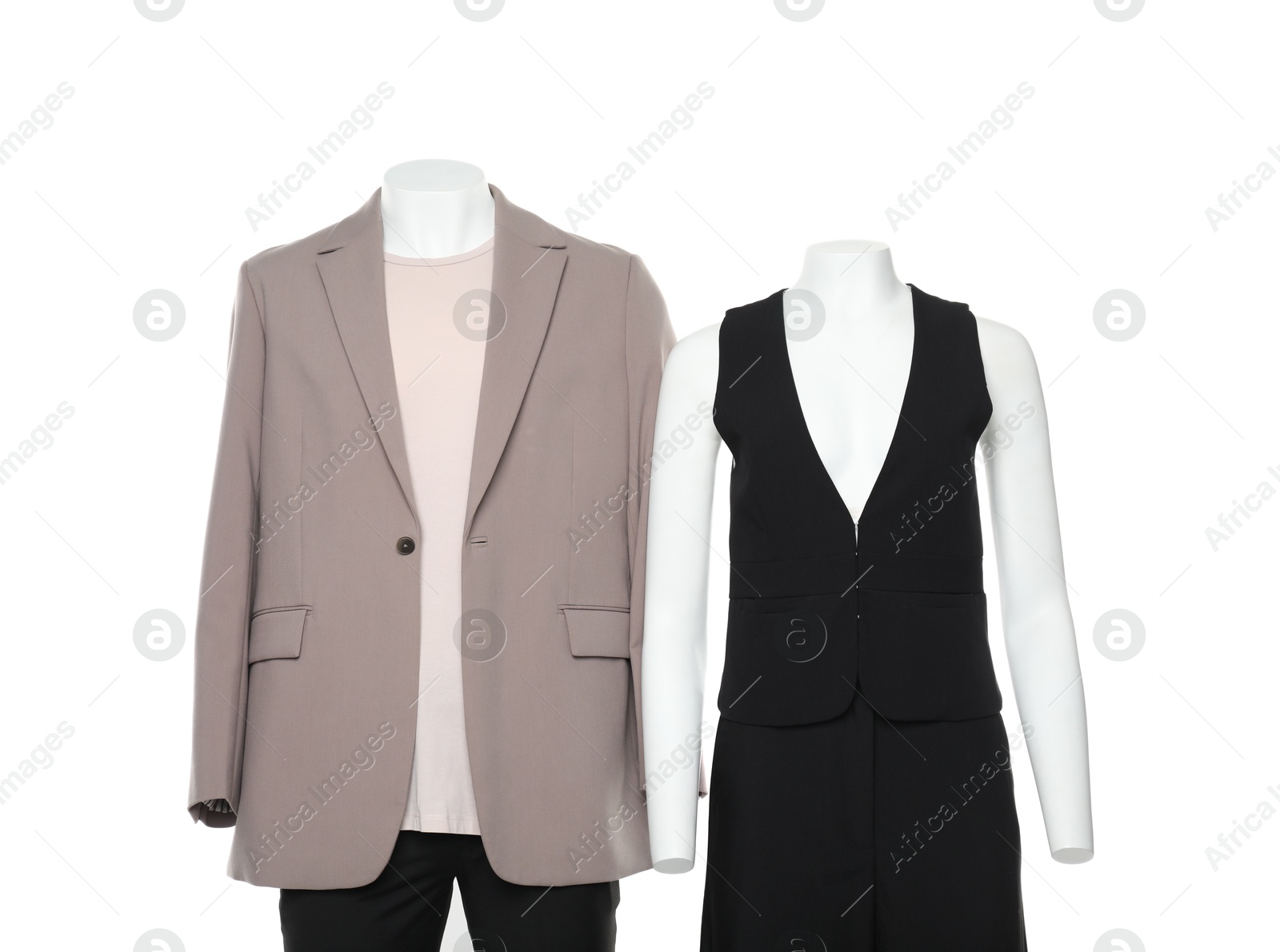 Photo of Female and male mannequins with stylish outfits isolated on white