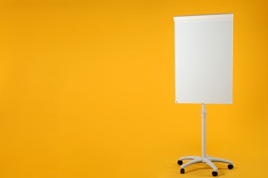 Flip chart on orange background. Mockup for design