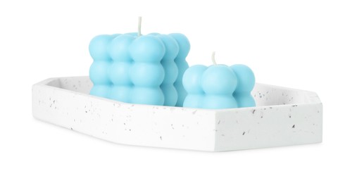 Photo of Beautiful light blue bubble candles isolated on white