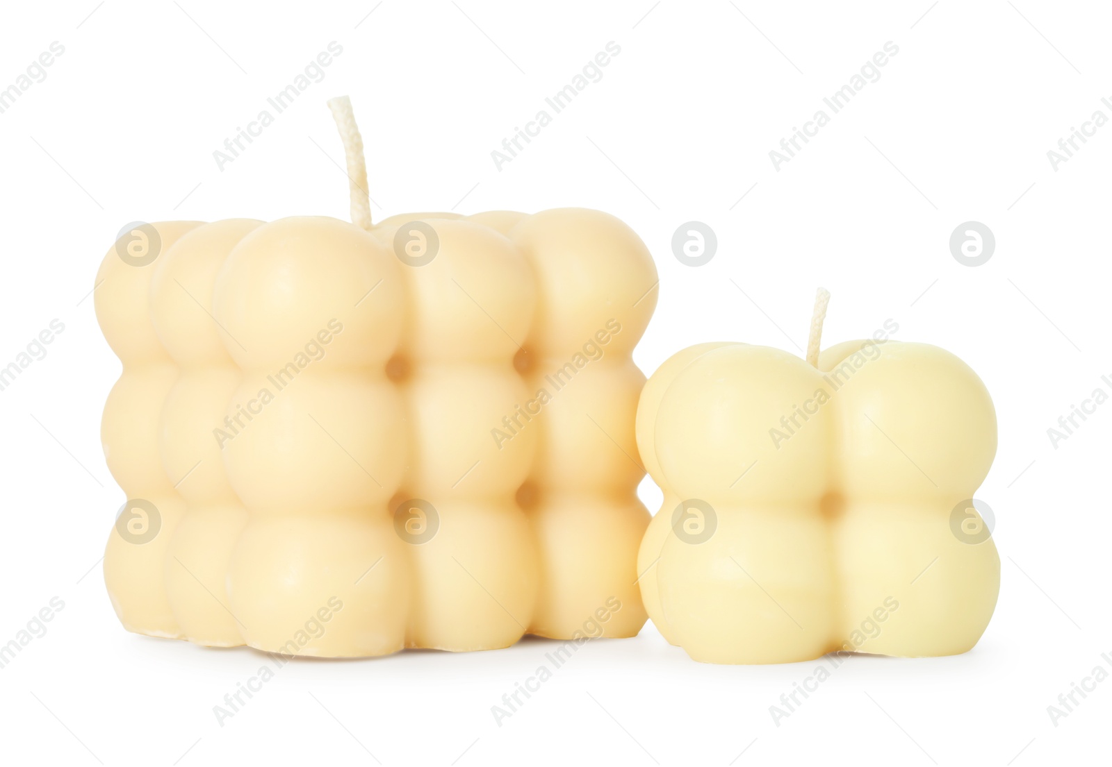 Photo of Two beautiful bubble candles isolated on white