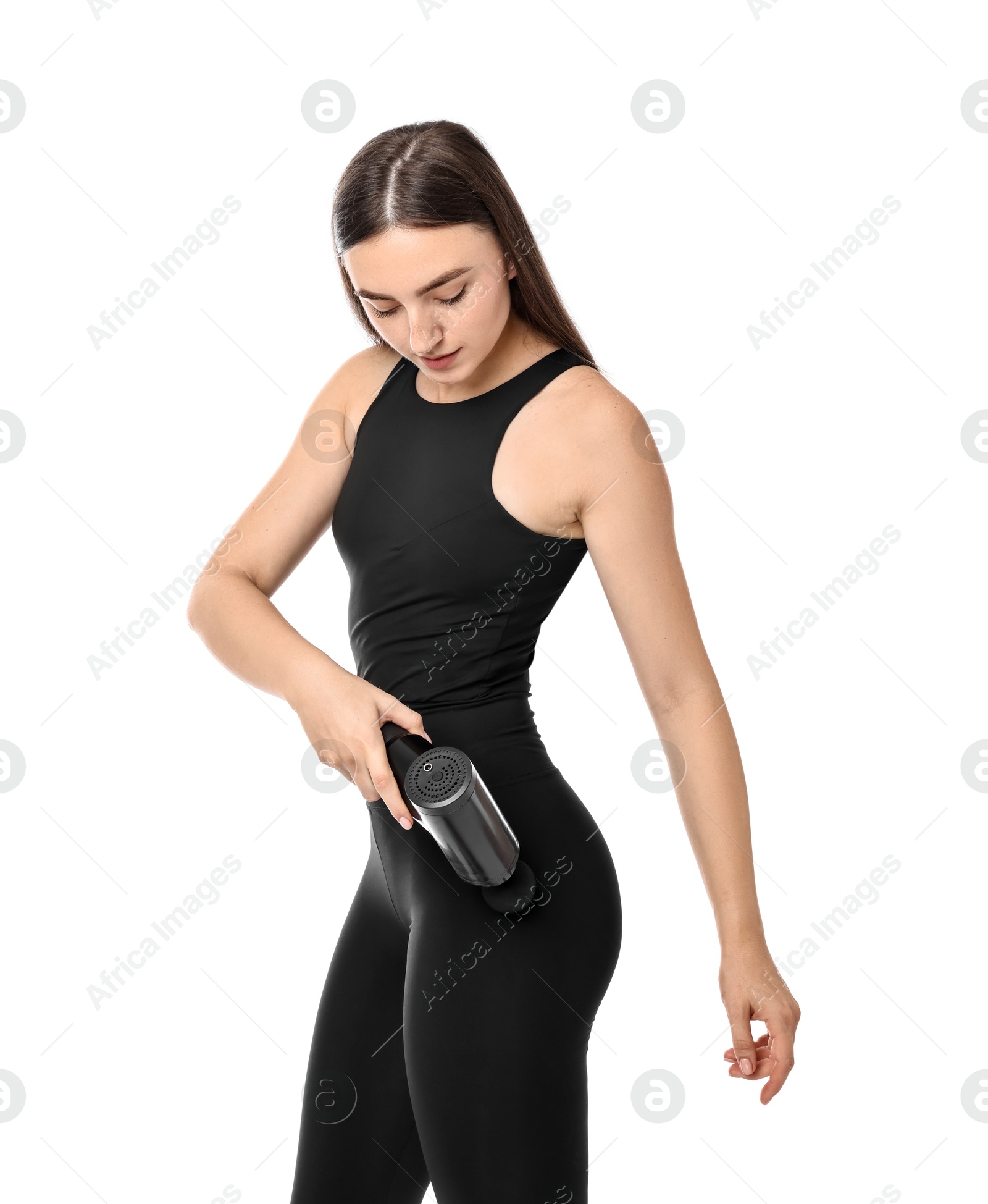 Photo of Woman using percussive massager to relieve hip muscles on white background