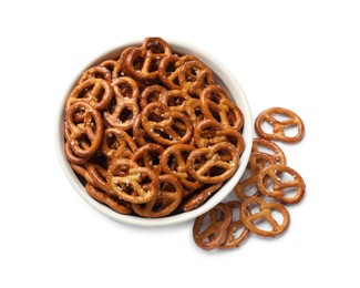 Photo of Delicious pretzel crackers in bowl isolated on white, top view