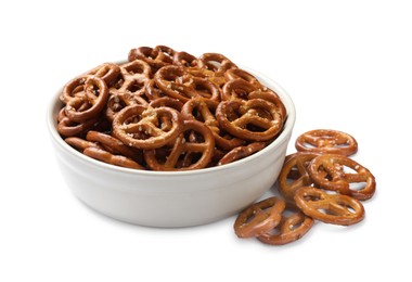 Photo of Delicious pretzel crackers in bowl isolated on white