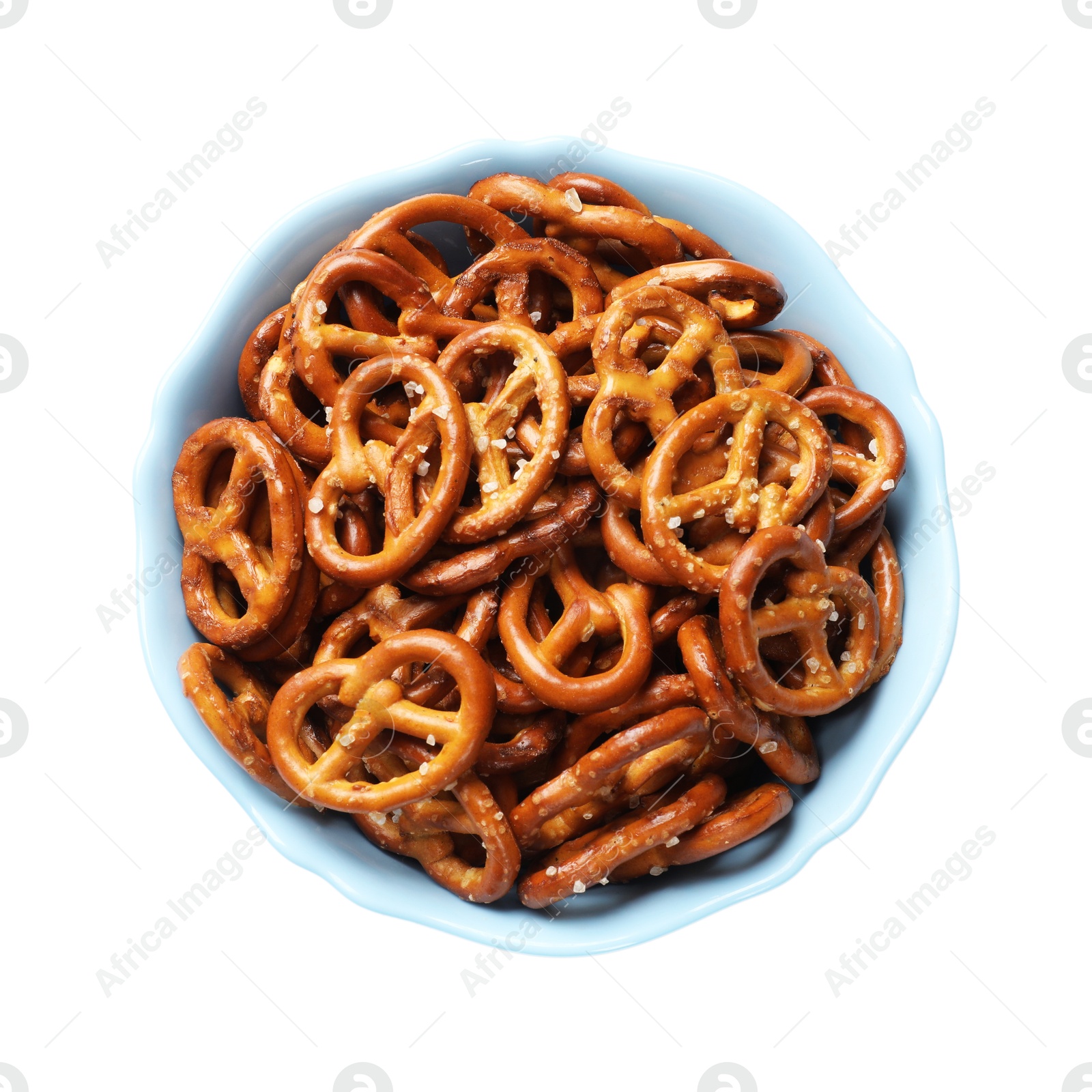 Photo of Delicious pretzel crackers in bowl isolated on white, top view