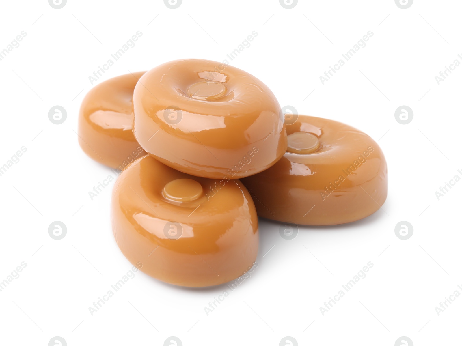 Photo of Tasty hard toffee candies isolated on white