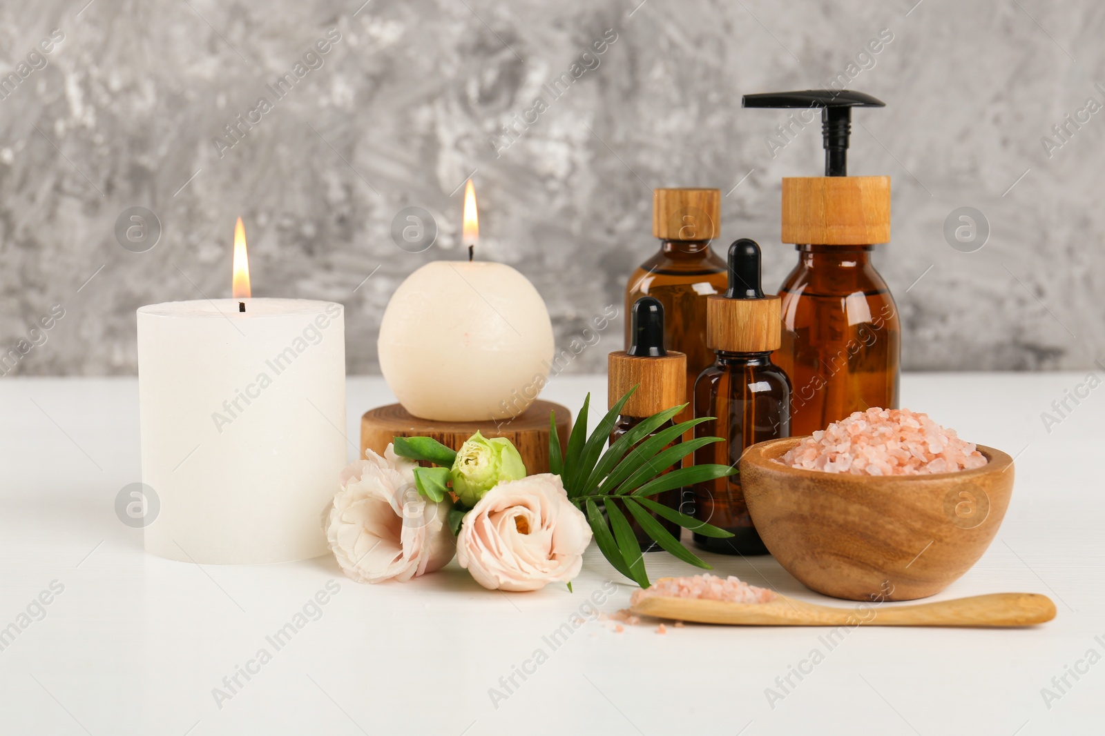 Photo of Spa composition with cosmetic products on white table