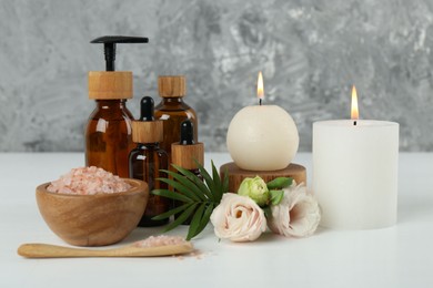 Photo of Spa composition with cosmetic products on white table