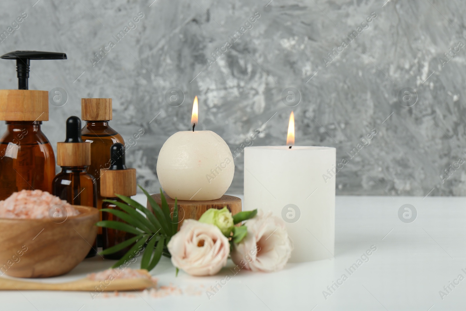 Photo of Spa composition with cosmetic products on white table