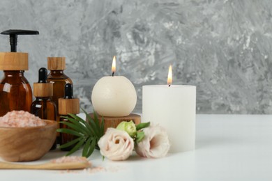 Photo of Spa composition with cosmetic products on white table