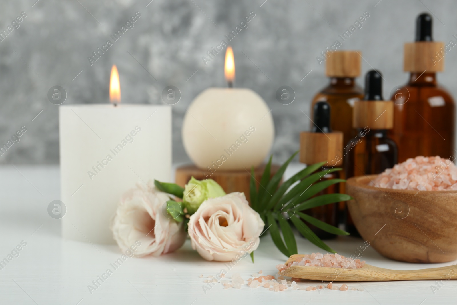 Photo of Spa composition with cosmetic products on white table