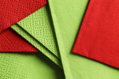 Photo of Red and green tissues as background, top view