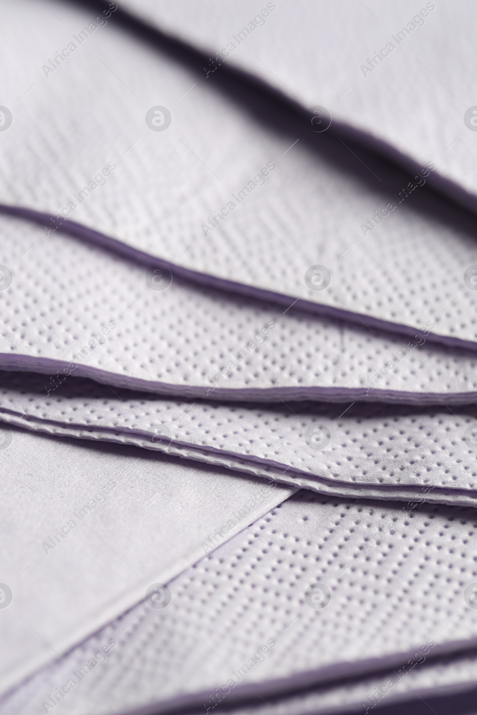 Photo of Clean light grey tissues as background, closeup