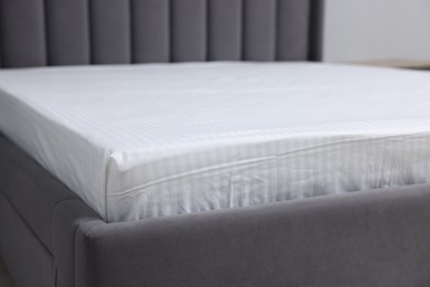 Comfortable bed with clean linens at home, closeup