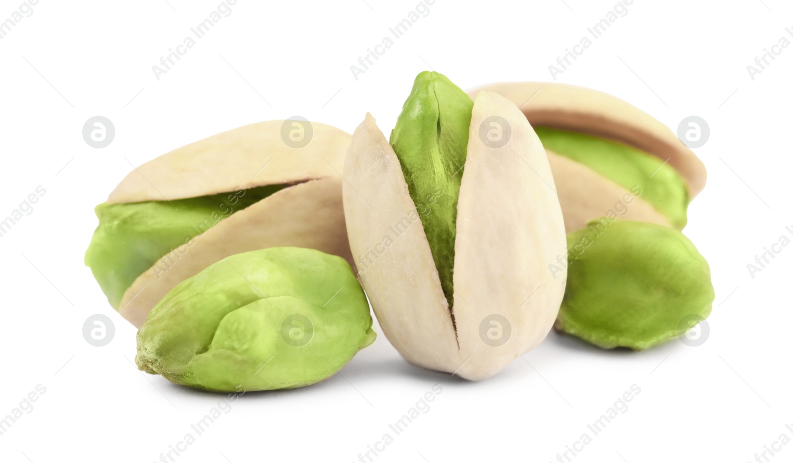 Image of Many tasty pistachio nuts on white background