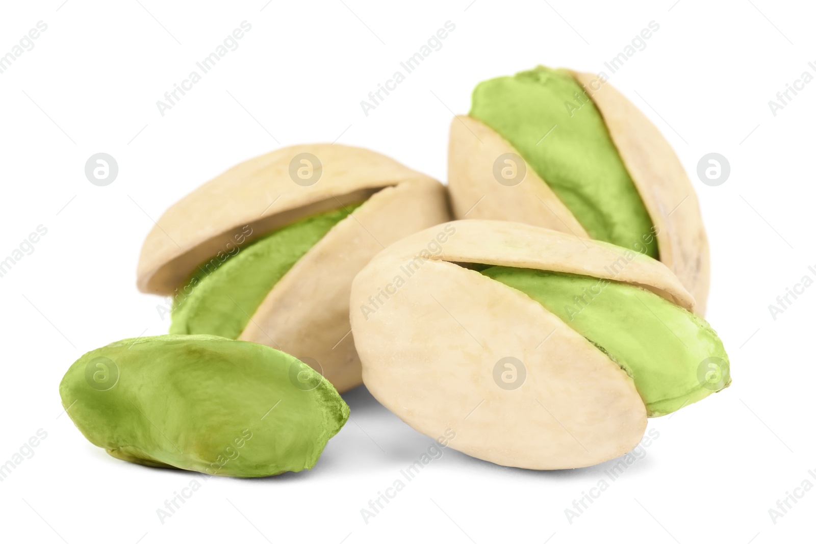 Image of Many tasty pistachio nuts on white background