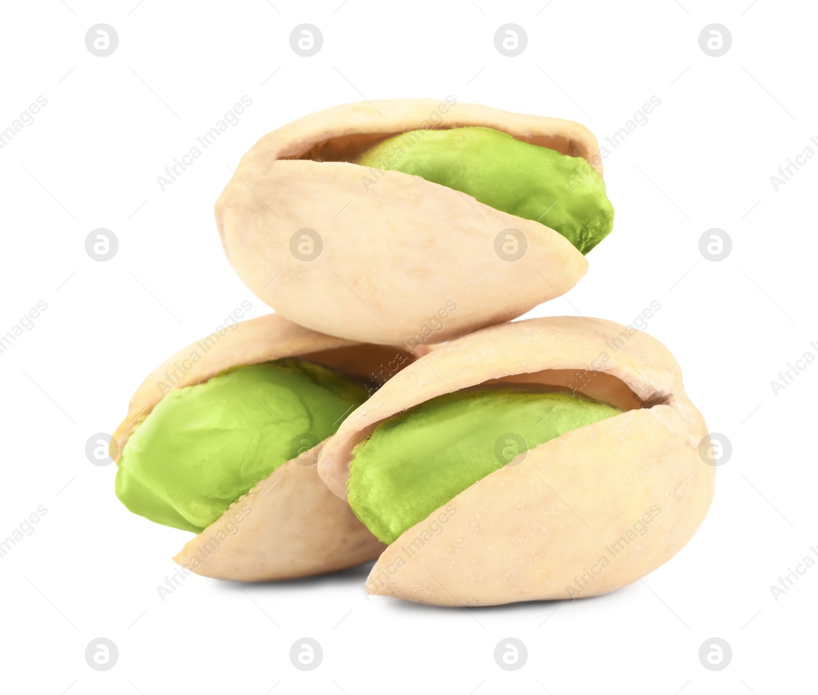 Image of Three tasty pistachio nuts on white background