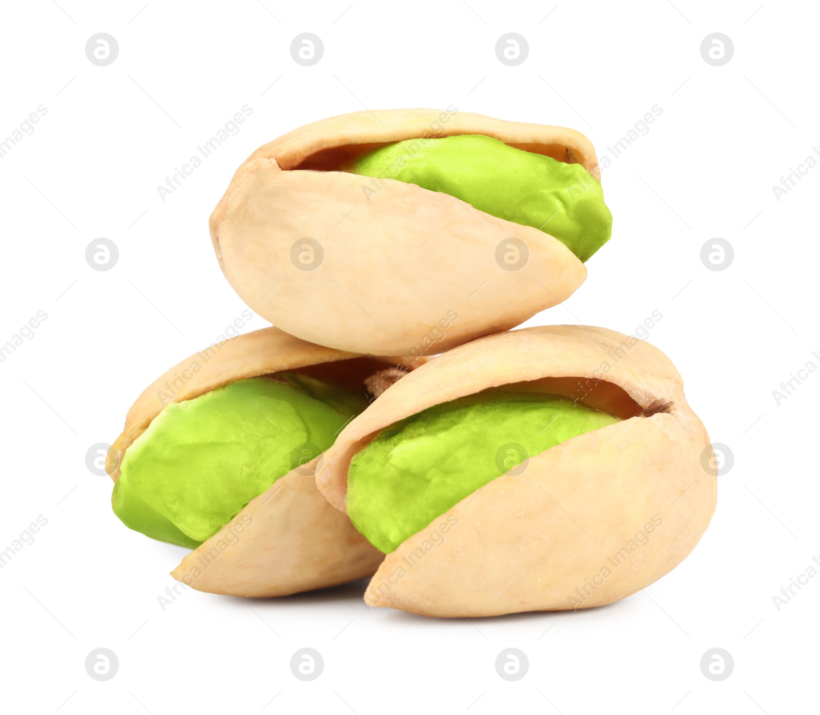 Image of Three tasty pistachio nuts on white background