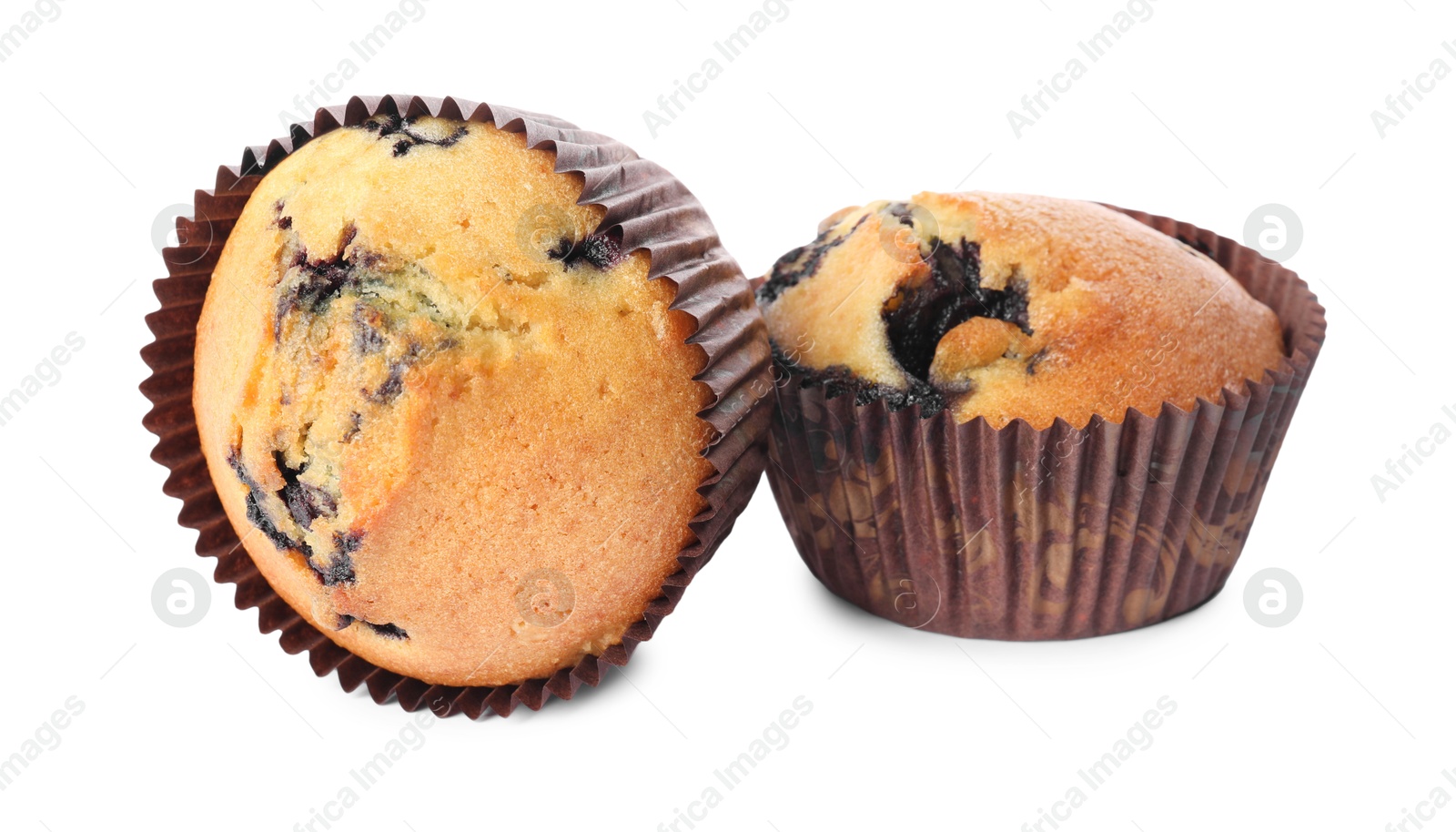 Photo of Delicious sweet muffins with blueberries isolated on white