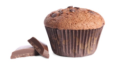 Photo of Delicious sweet muffin with chocolate chips isolated on white