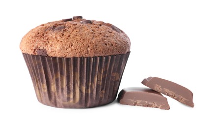 Photo of Delicious sweet muffin with chocolate chips isolated on white