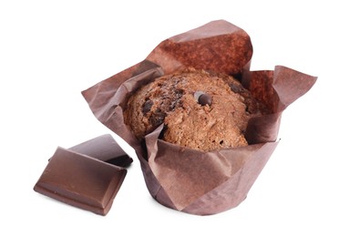 Photo of Delicious sweet muffin with chocolate chips isolated on white