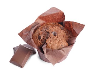 Photo of Delicious sweet muffin with chocolate chips isolated on white