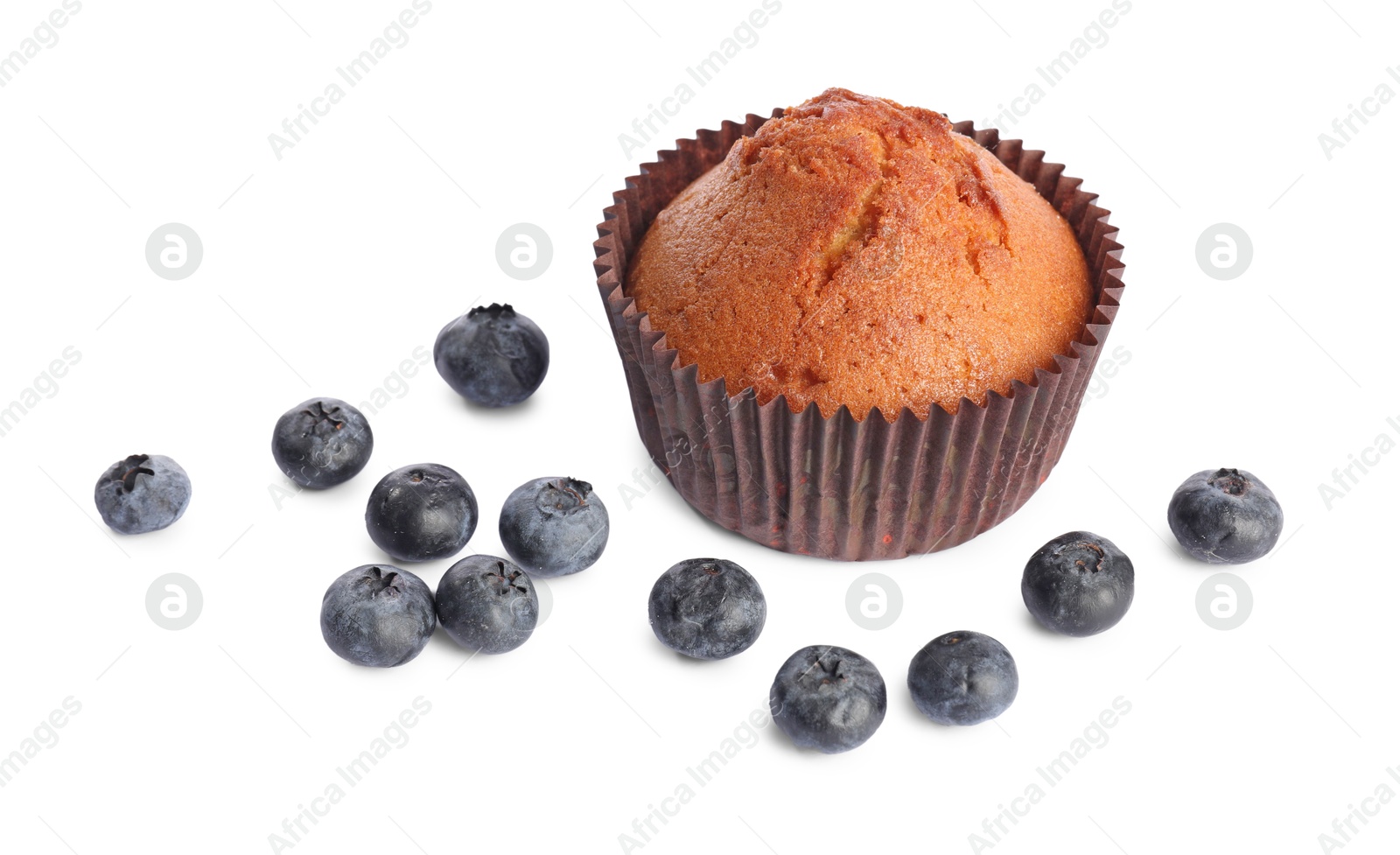 Photo of Delicious sweet muffin and blueberries isolated on white