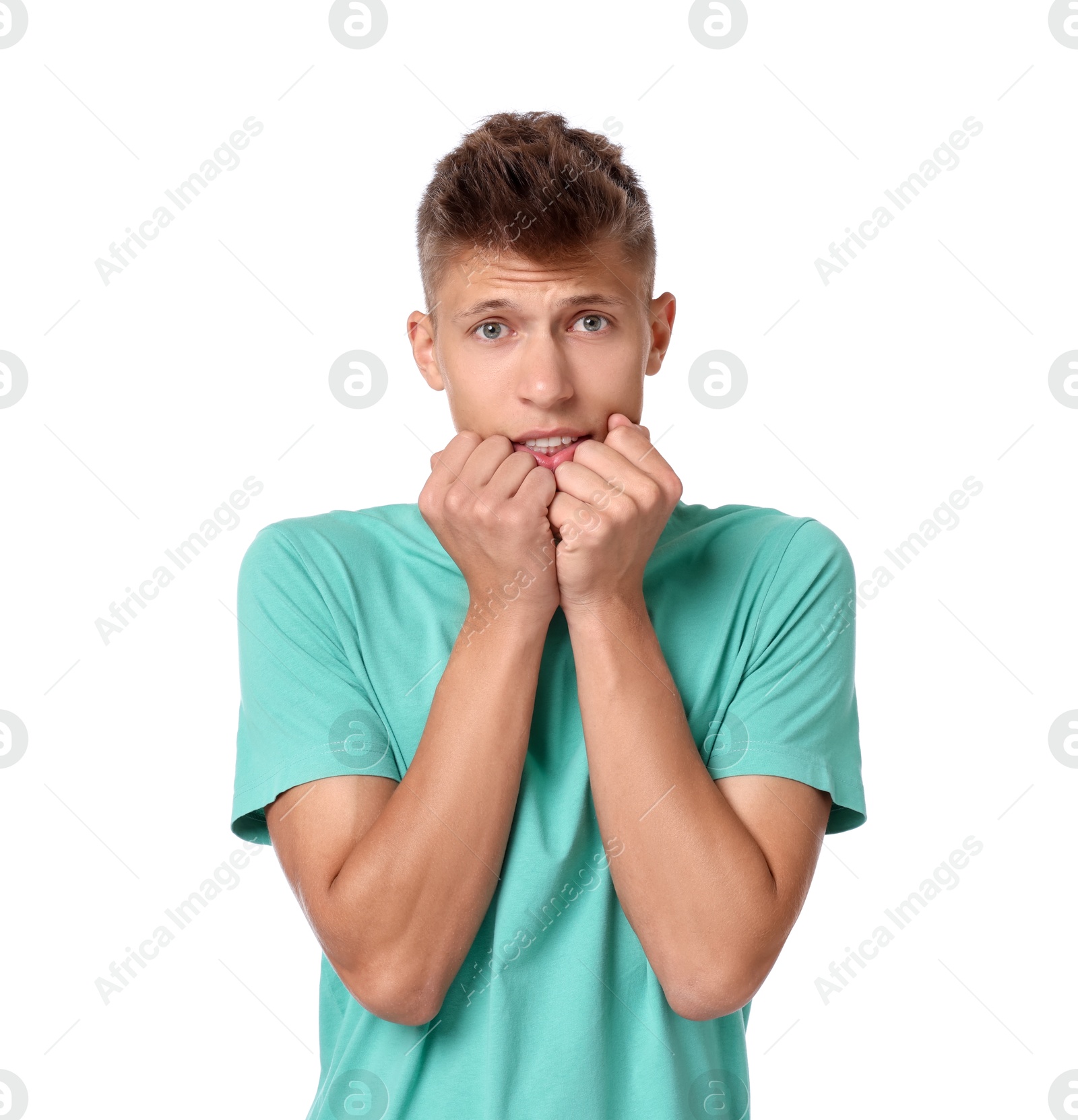 Photo of Portrait of scared young man on white background