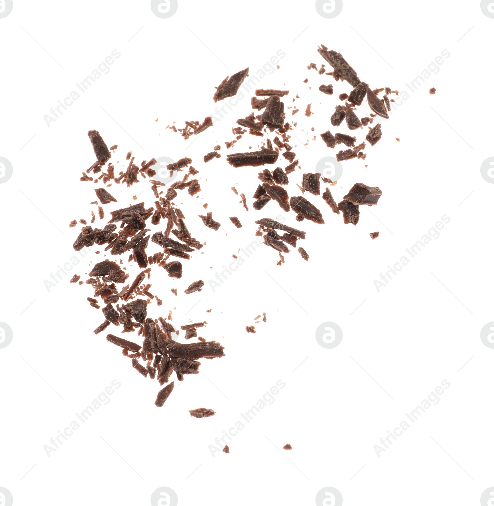 Photo of Many crushed chocolate pieces isolated on white