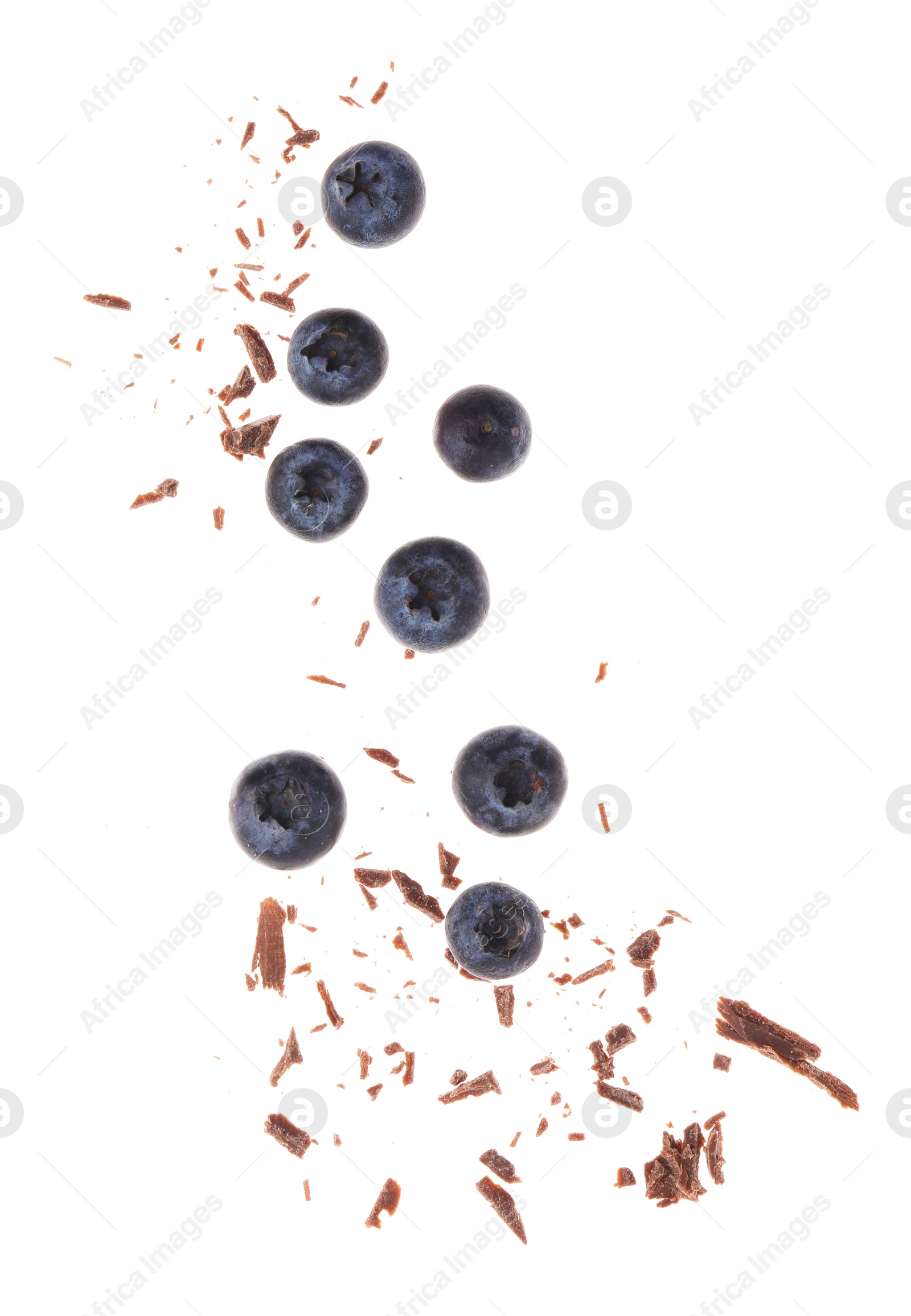 Photo of Fresh blueberries and crushed chocolate pieces isolated on white