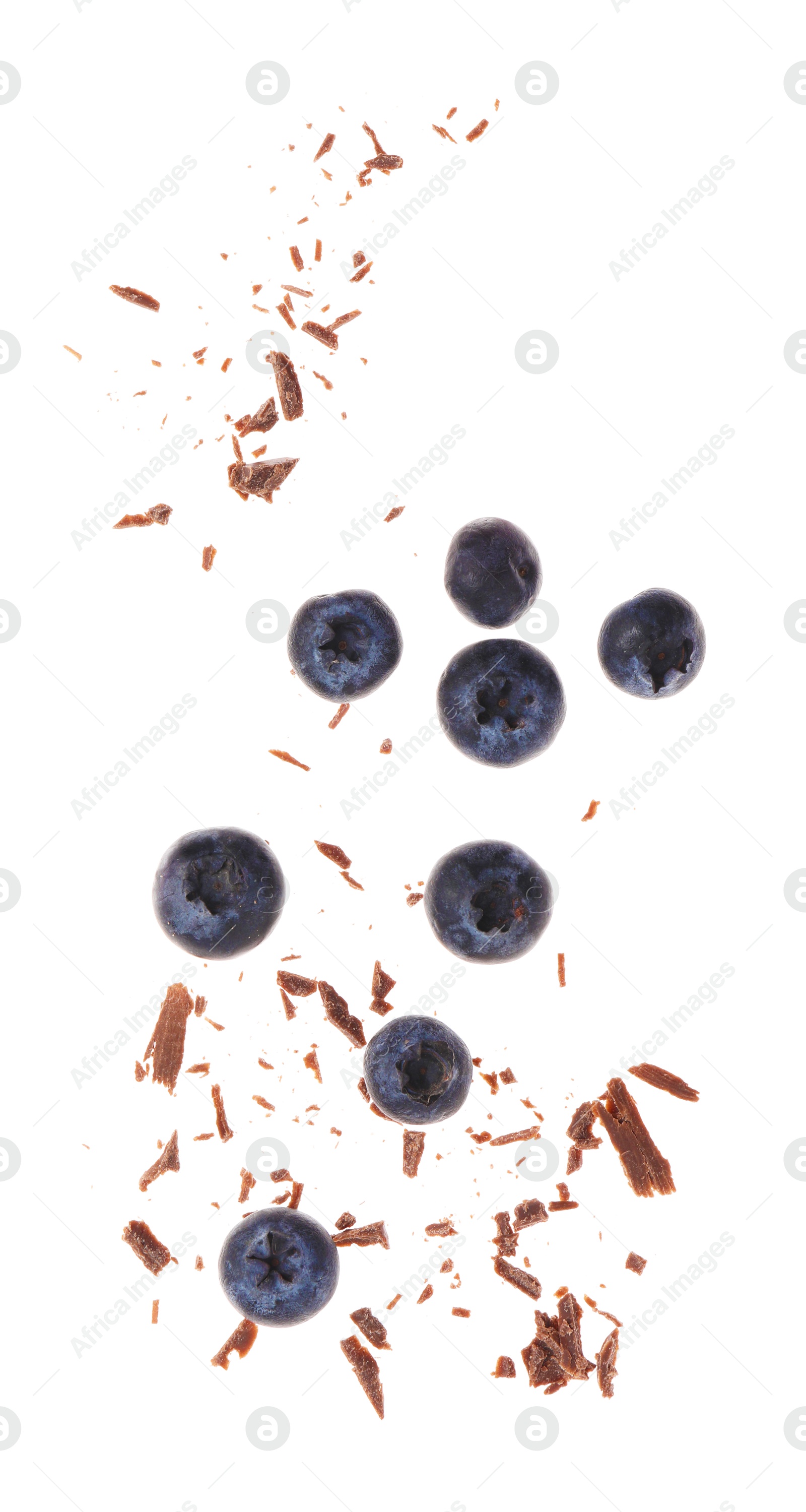 Photo of Fresh blueberries and crushed chocolate pieces isolated on white