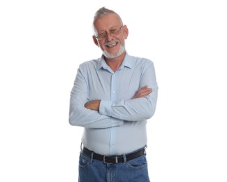 Smiling senior man with crossed arms on white background