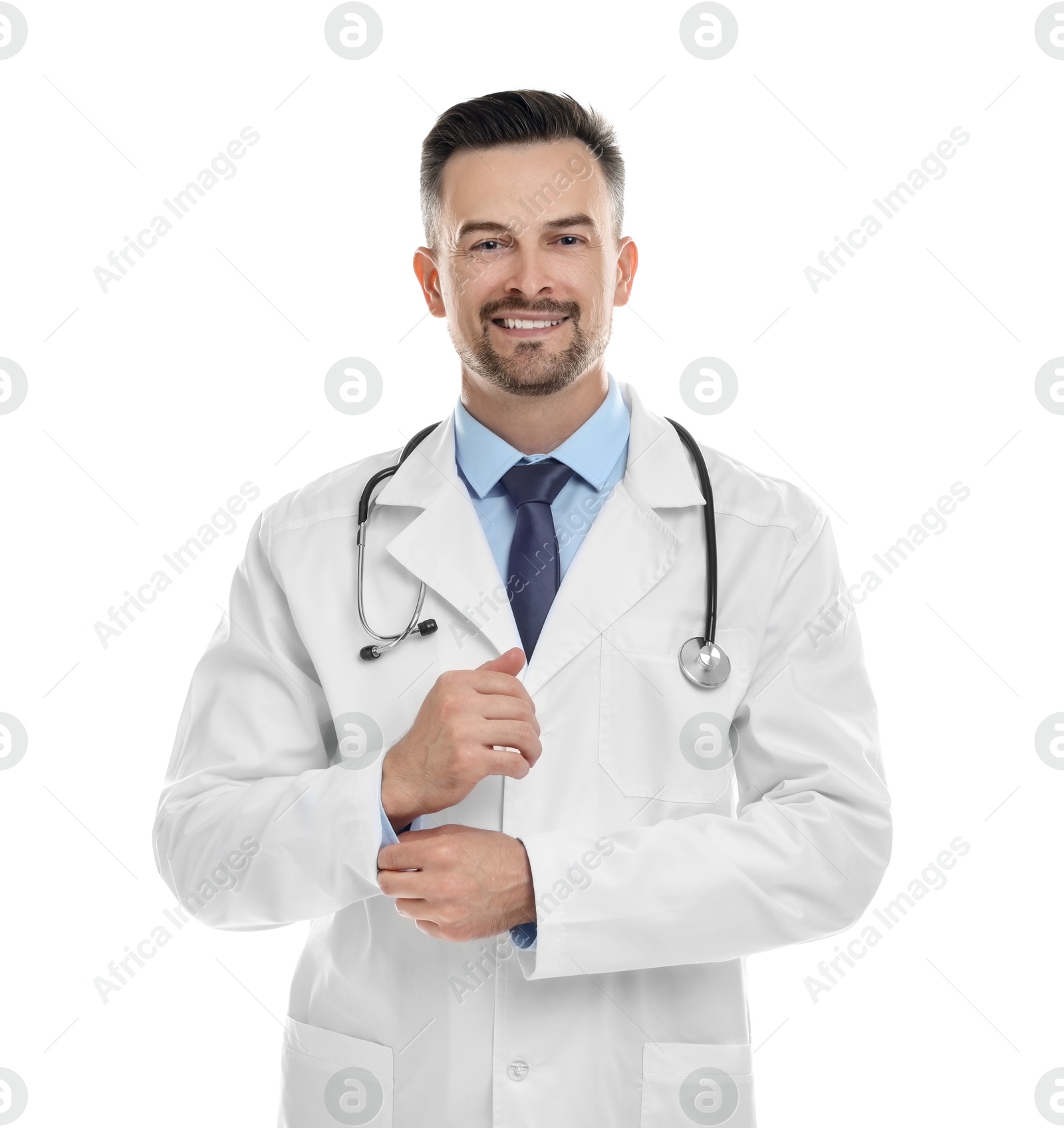 Photo of Smiling doctor with stethoscope isolated on white