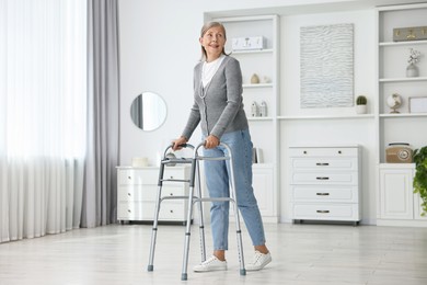 Senior woman with walking frame at home