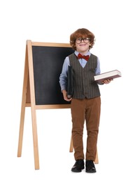 Little boy with book and folder near chalkboard on white background. Dreaming about future profession