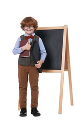 Photo of Little boy with book and folder near chalkboard on white background. Dreaming about future profession