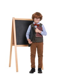 Little boy with book and folder near chalkboard on white background. Dreaming about future profession