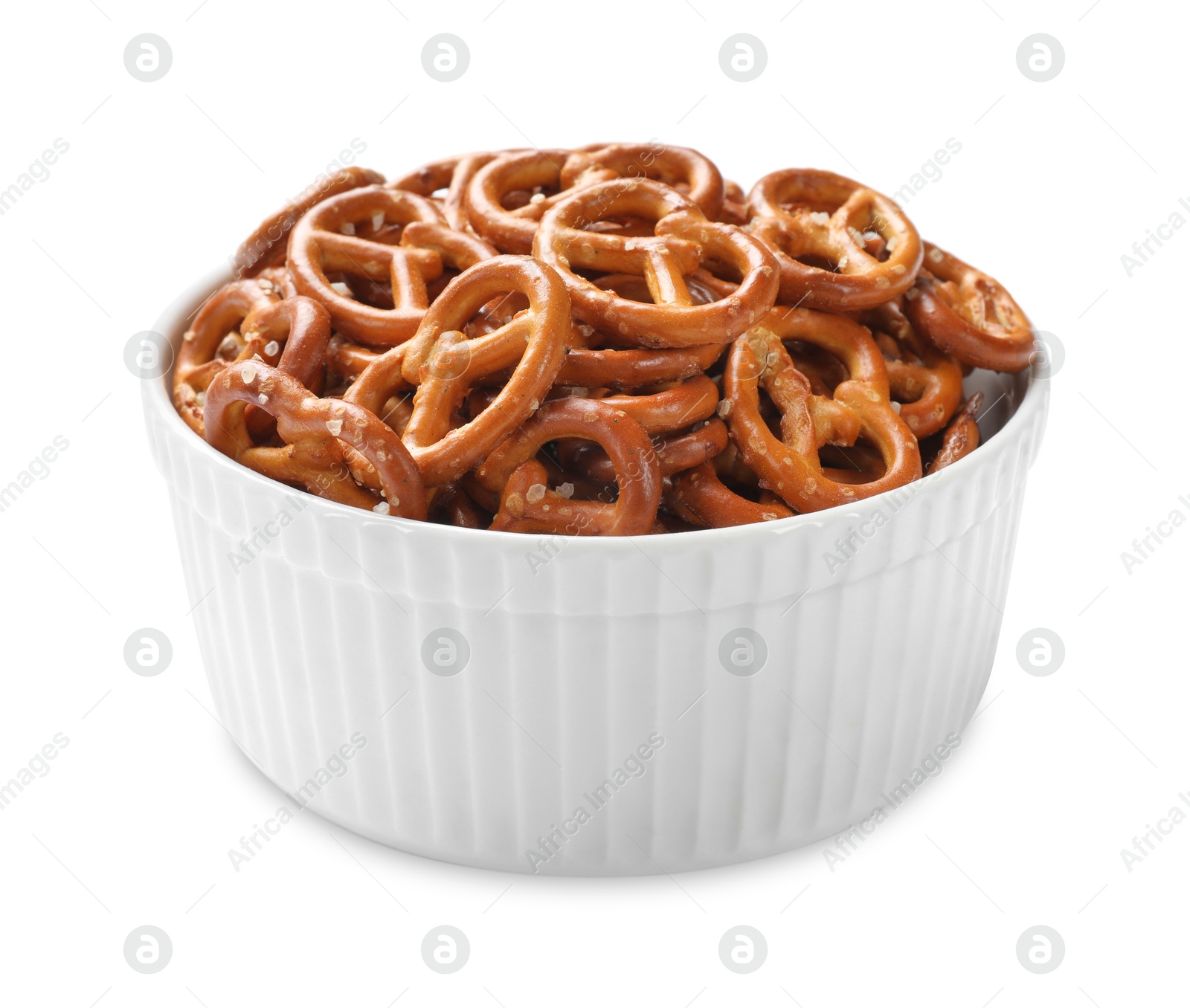 Photo of Delicious pretzel crackers in bowl isolated on white