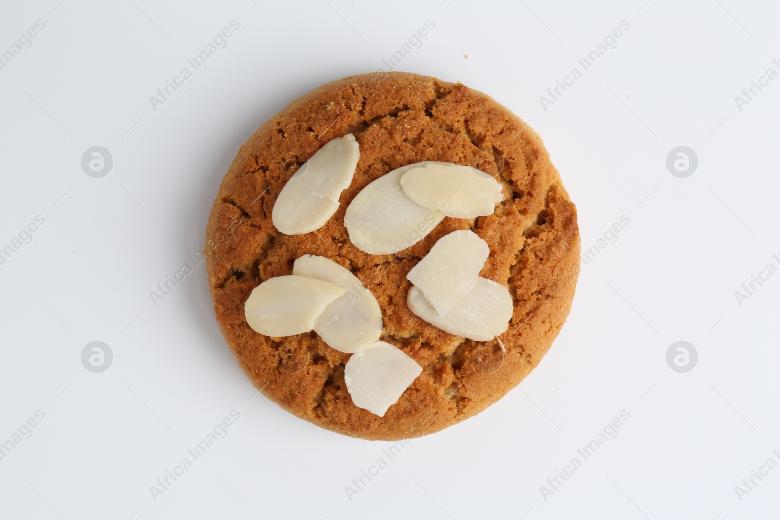 Photo of One tasty cookie with almond flakes on white background, top view