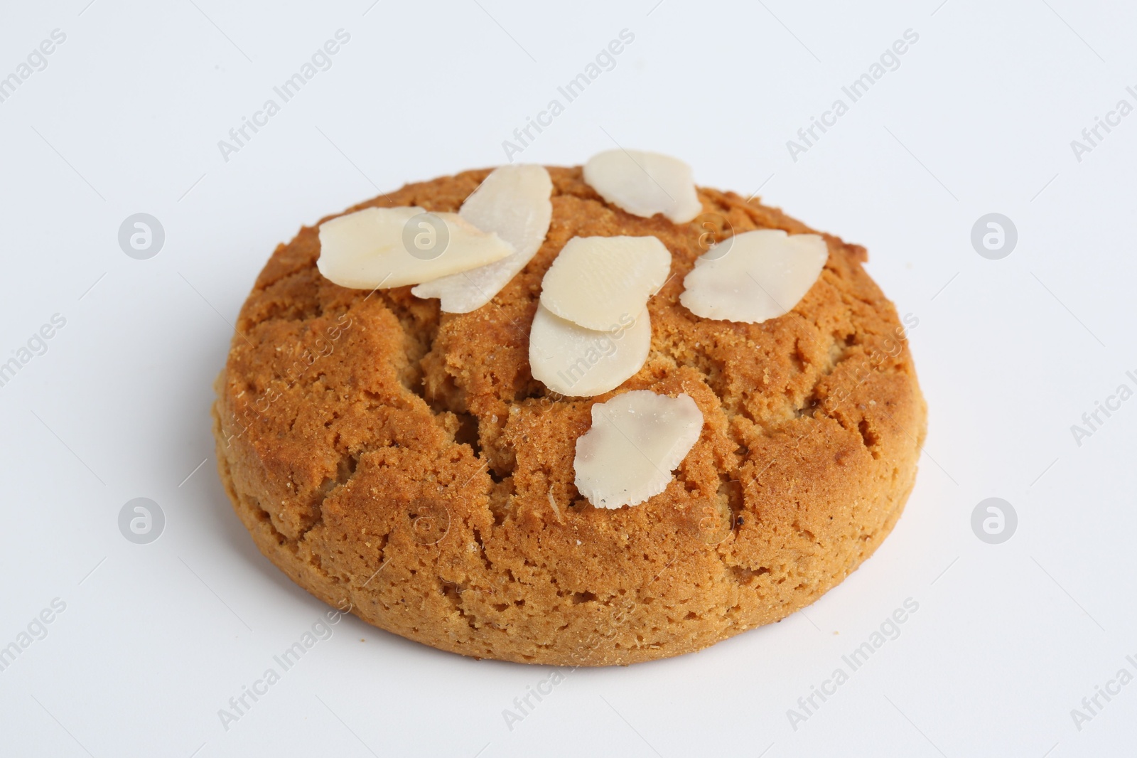 Photo of One tasty cookie with almond flakes on white background