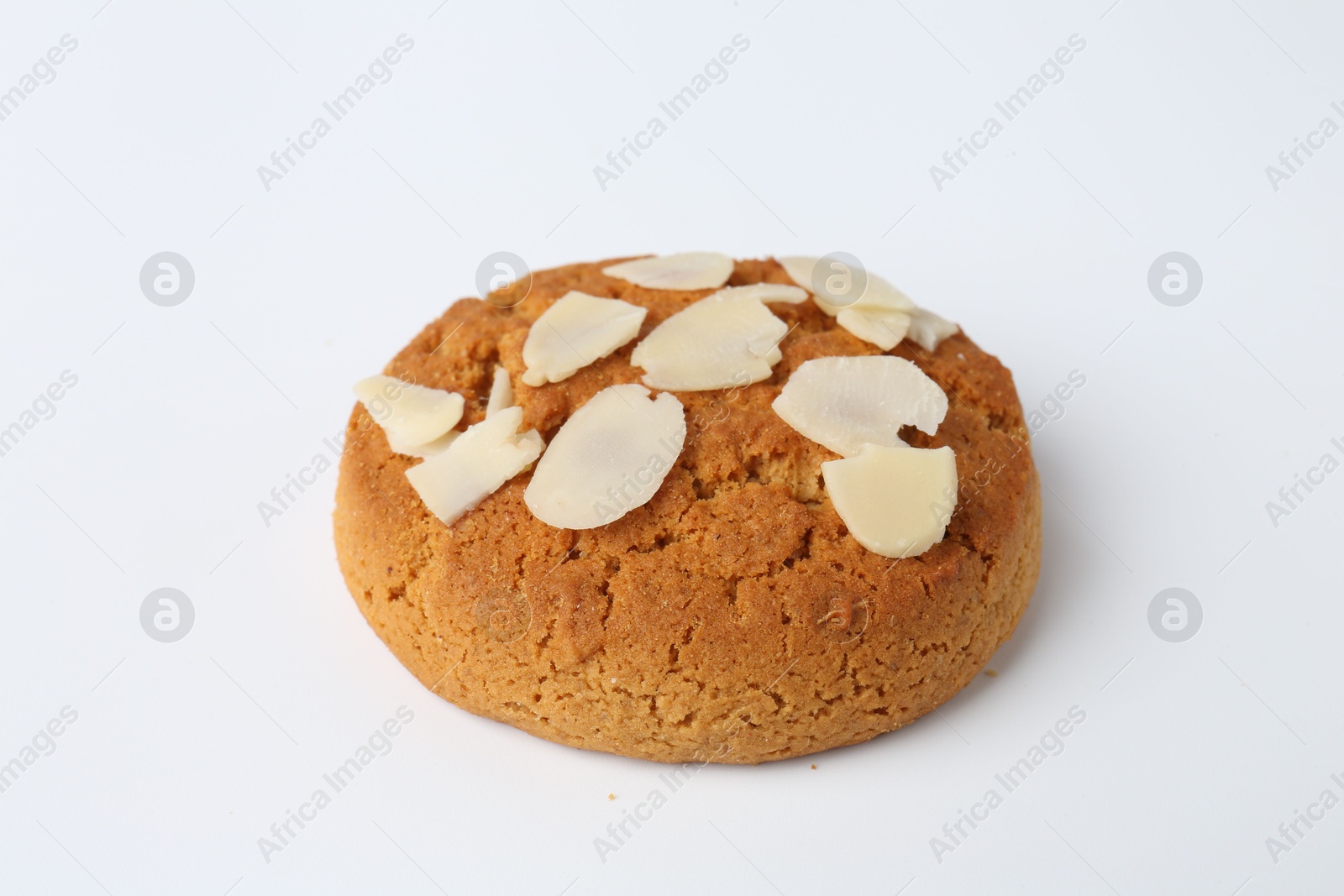 Photo of One tasty cookie with almond flakes on white background