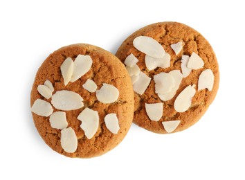 Photo of Tasty cookies with almond flakes isolated on white, top view