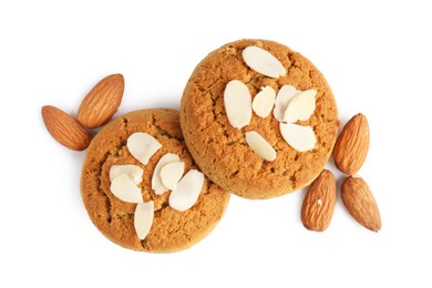 Photo of Tasty cookies with almonds isolated on white, top view