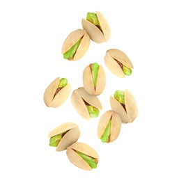 Image of Tasty pistachios in air on white background