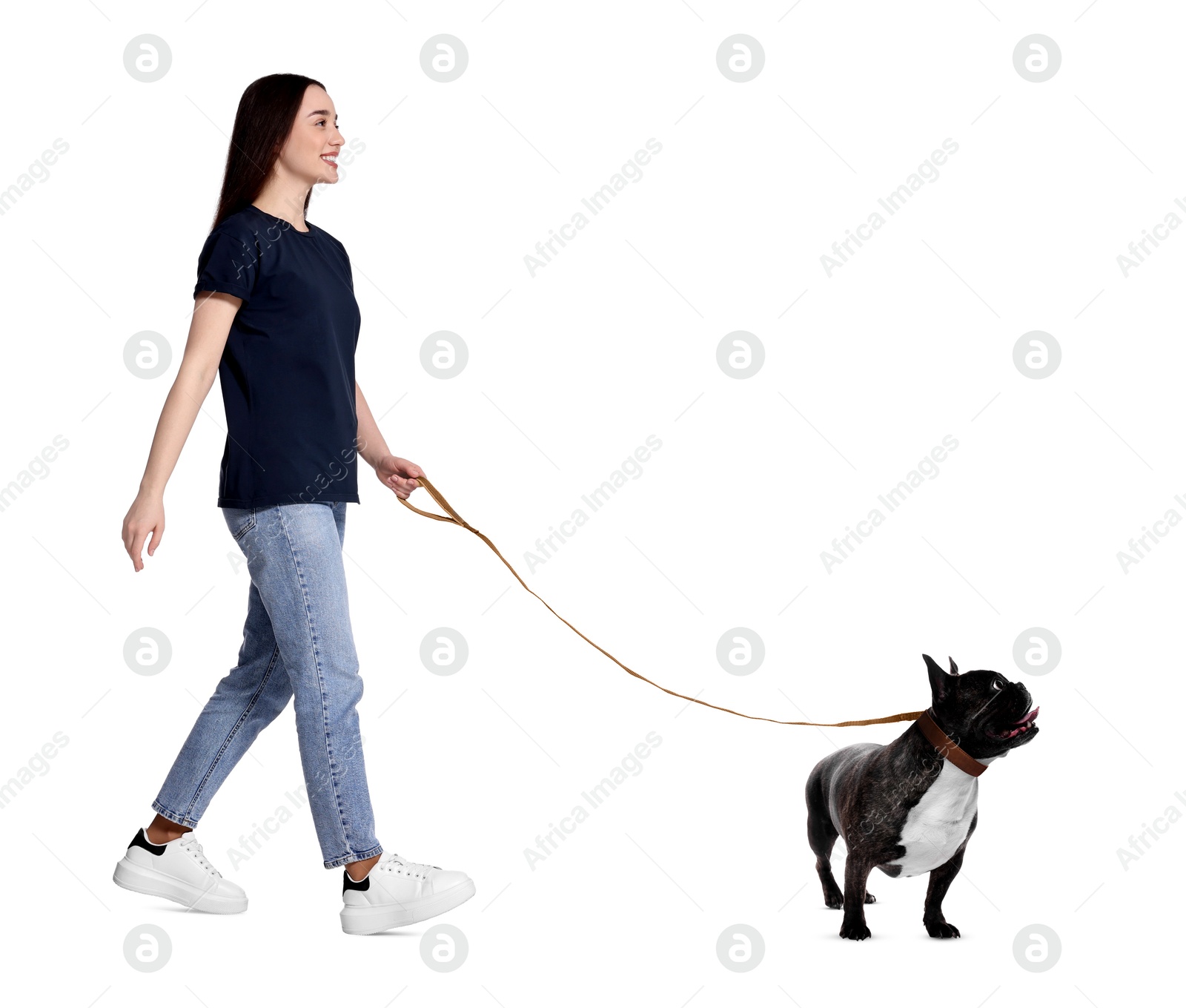 Image of Happy woman walking her dog on white background