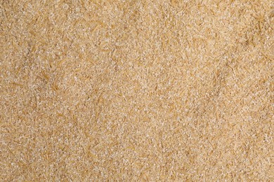 Pile of oat bran as background, top view