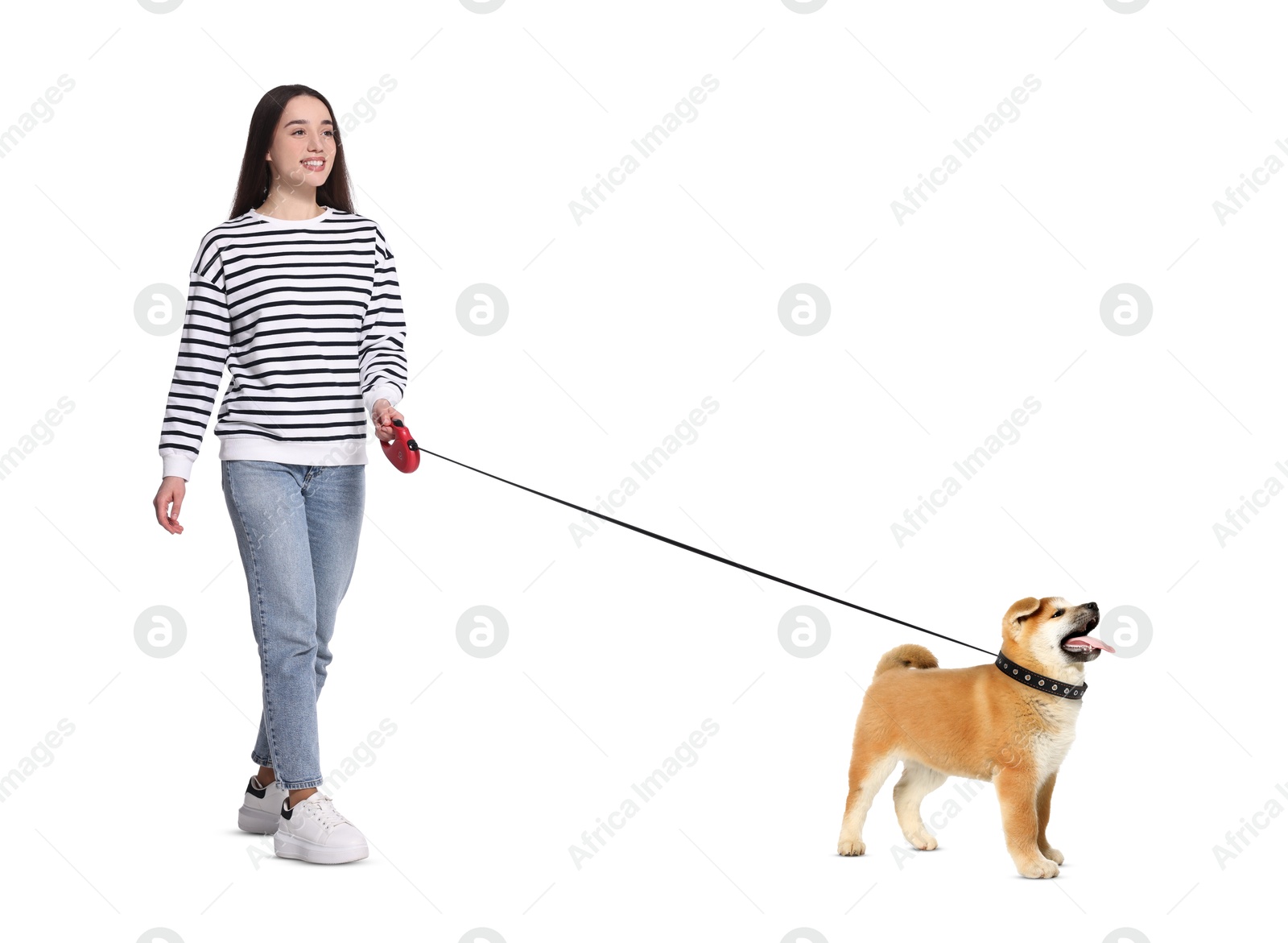 Image of Happy woman walking her dog on white background