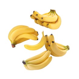 Image of Many yellow bananas in air on white background